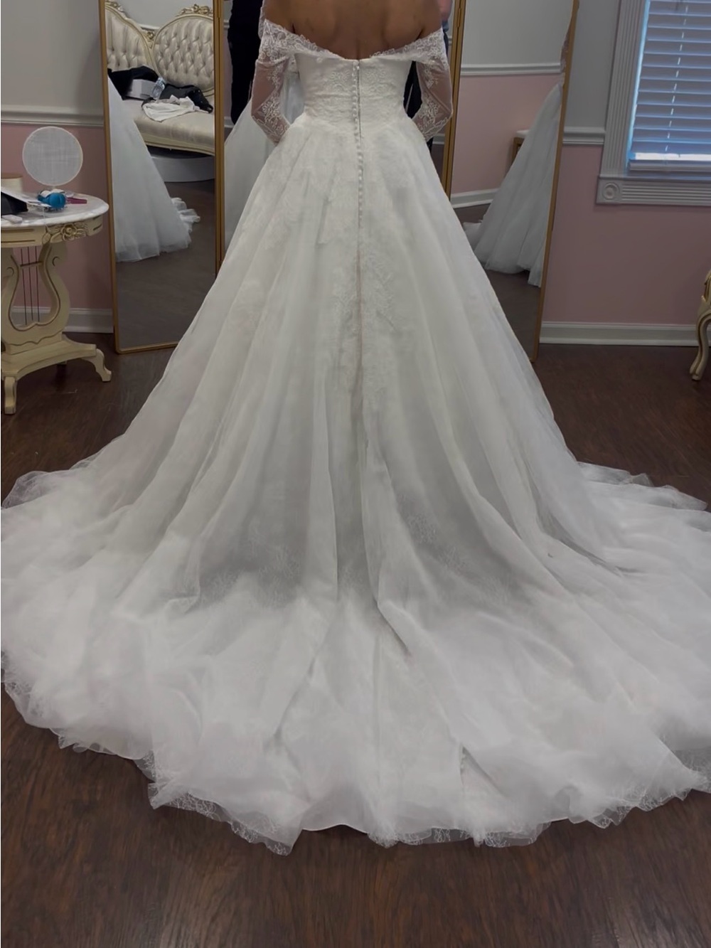 Elegant White Bridal Gown with Long Lace Veil